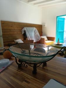 a glass bowl sitting on top of a table at Douceur de la mer des caraibes in Sainte-Rose