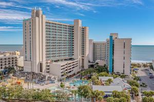 an aerial view of a resort with a pool and the ocean at Sand Dunes Resort Unit 1406 - Ocean View in Myrtle Beach