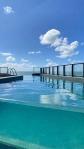 Πισίνα στο ή κοντά στο Brezze - Flat Bessa - pé na areia