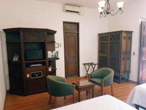 Kuchyň nebo kuchyňský kout v ubytování HOTEL MI SOLAR EJECUTIVO