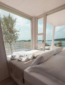 Postel nebo postele na pokoji v ubytování Villa Monika - Resort VITA