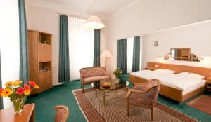 Postel nebo postele na pokoji v ubytování Hotel Alte Post