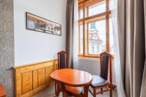 Posezení v ubytování Kafka Prague rooms