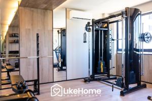 a fitness centre with a gym with a simulator at Vivir Maria Paula - Intermares in Cabedelo