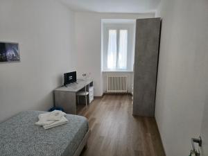 Postel nebo postele na pokoji v ubytování DA NI TO Rooms 4 + 11 fotografií