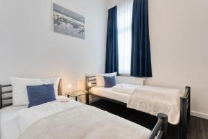 Postel nebo postele na pokoji v ubytování Buten un Binnen