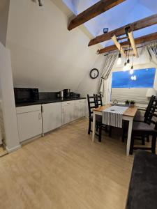 Kuchyň nebo kuchyňský kout v ubytování Ferienhaus Dünenweg + 12 fotografií