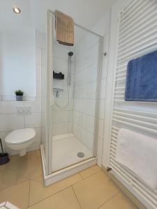 Koupelna v ubytování Ferienhaus Dünenweg