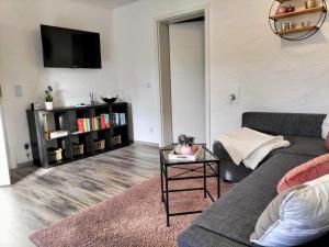 Ein Sitzbereich in der Unterkunft Ferienwohnung Schneider
