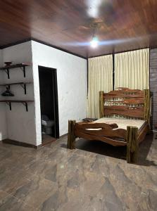 Una cama o camas en una habitación de Al renacer finca 10 fotos más