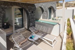 A patio or other outdoor area at Depalyma Suites