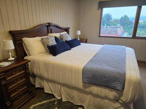 Postel nebo postele na pokoji v ubytování Santa Rosa Hotel boutique