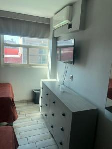 Kuchyň nebo kuchyňský kout v ubytování Hotel Colon Express