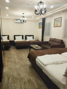 Voodi või voodid majutusasutuse Boutique Living Hotel toas