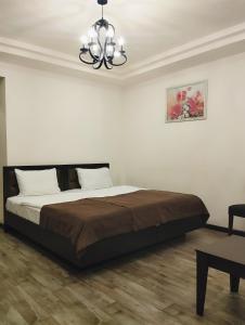 Voodi või voodid majutusasutuse Boutique Living Hotel toas