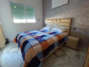 En eller flere senger på et rom på Azur Luxury View - Panoramic Apartment in Fes