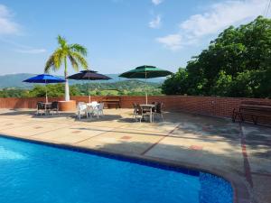 Piscina de la sau aproape de Hotel OK El Edén Tocaima