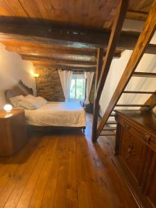 En eller flere senge i et værelse på La charmante **** Maison Cap Corse, Tomino