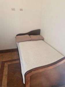 Postel nebo postele na pokoji v ubytování Cozy private room Itzá