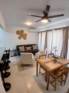 a living room with a table and a couch at Pool Feelings Luxury Edition in Punta Cana