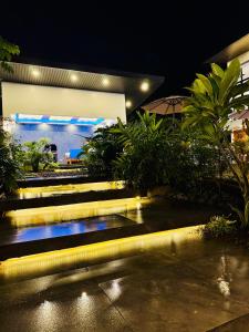 a set of stairs with lights in a building at Tomeizah in Sampong