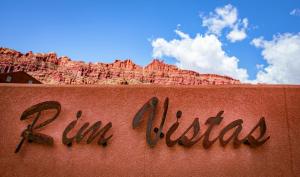 a sign with the name of a mountain at Moab Adventure Basecamp in Moab