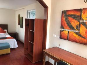 Postel nebo postele na pokoji v ubytování hotel el portal de las Flores, Alojamiento Rural