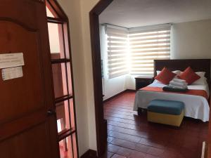 Postel nebo postele na pokoji v ubytování hotel el portal de las Flores, Alojamiento Rural