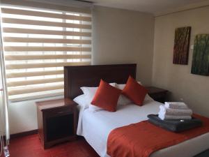 Postel nebo postele na pokoji v ubytování hotel el portal de las Flores, Alojamiento Rural