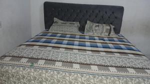 Ένα ή περισσότερα κρεβάτια σε δωμάτιο στο Spring Hotel