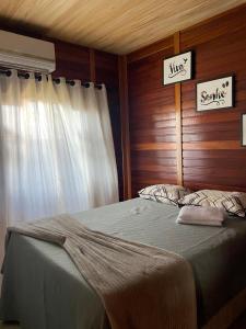 Postel nebo postele na pokoji v ubytování Casa em Penha - Armação-Itapocoroy