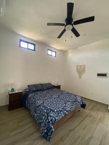 Postel nebo postele na pokoji v ubytování Casa Loto B