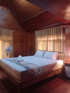 Кровать или кровати в номере Rakatta Lombok