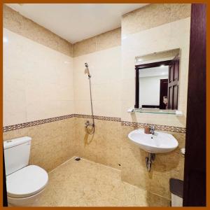 Koupelna v ubytování Nam Xuan Premium Hotel