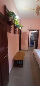 Postel nebo postele na pokoji v ubytování Nakshatra Homestay