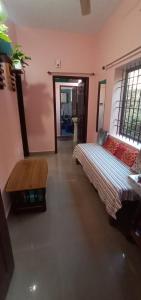 Postel nebo postele na pokoji v ubytování Nakshatra Homestay