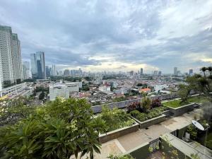 Nespecifikovaný výhled na destinaci Jakarta nebo výhled na město při pohledu z prázdninového domu + 21 fotografií