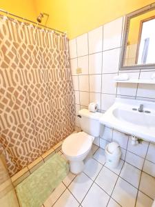 Baðherbergi á Cabinas Coco Alegre