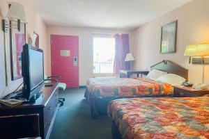 Et tv og/eller underholdning på OYO Hotel East Macon I-75