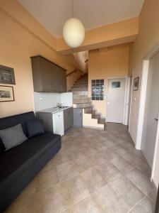 Kuchyň nebo kuchyňský kout v ubytování Peroulia Bay View Maisonette
