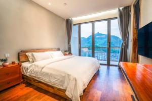 Katil atau katil-katil dalam bilik di Xianxiuju Garden Courtyard B&B