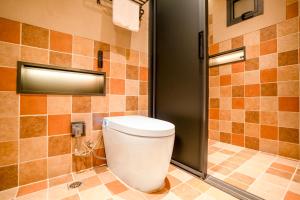 Bilik mandi di Xianxiuju Garden Courtyard B&B