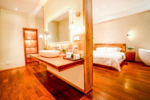 Katil atau katil-katil dalam bilik di Xianxiuju Garden Courtyard B&B
