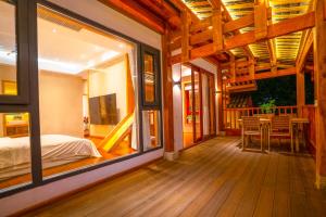 Katil atau katil-katil dalam bilik di Xianxiuju Garden Courtyard B&B