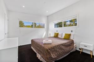 Ένα ή περισσότερα κρεβάτια σε δωμάτιο στο Alpine Vista Retreat +4 φωτογραφίες