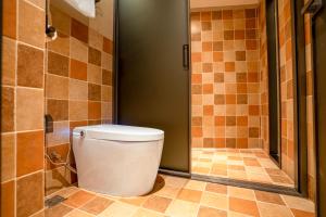 Bilik mandi di Xianxiuju Garden Courtyard B&B
