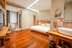 Katil atau katil-katil dalam bilik di Xianxiuju Garden Courtyard B&B
