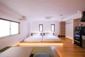 Ένα ή περισσότερα κρεβάτια σε δωμάτιο στο HOTEL ALL IN Kumamoto +37 φωτογραφίες