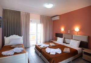 Postelja oz. postelje v sobi nastanitve Hotel Dionysos Polichrono + 37 fotografij
