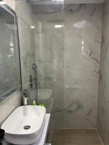 Koupelna v ubytování Hotel Portokali